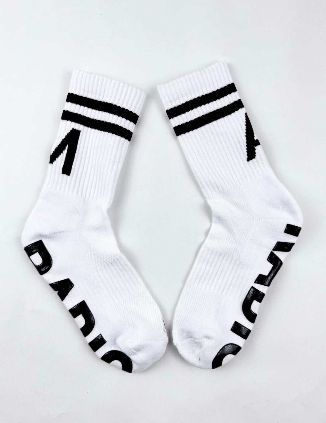 White RADIO Grip Socks with black lettering and non-slip bottom for men and women