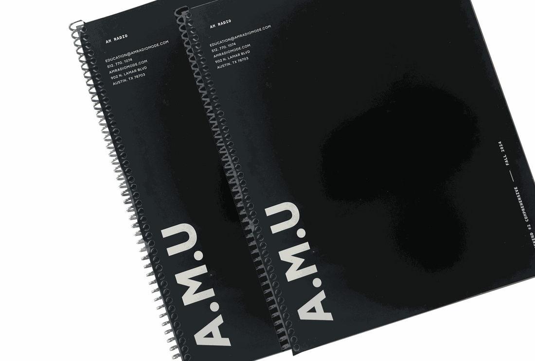 Authentic Method University Pilates program spiral notebooks with AMU branding