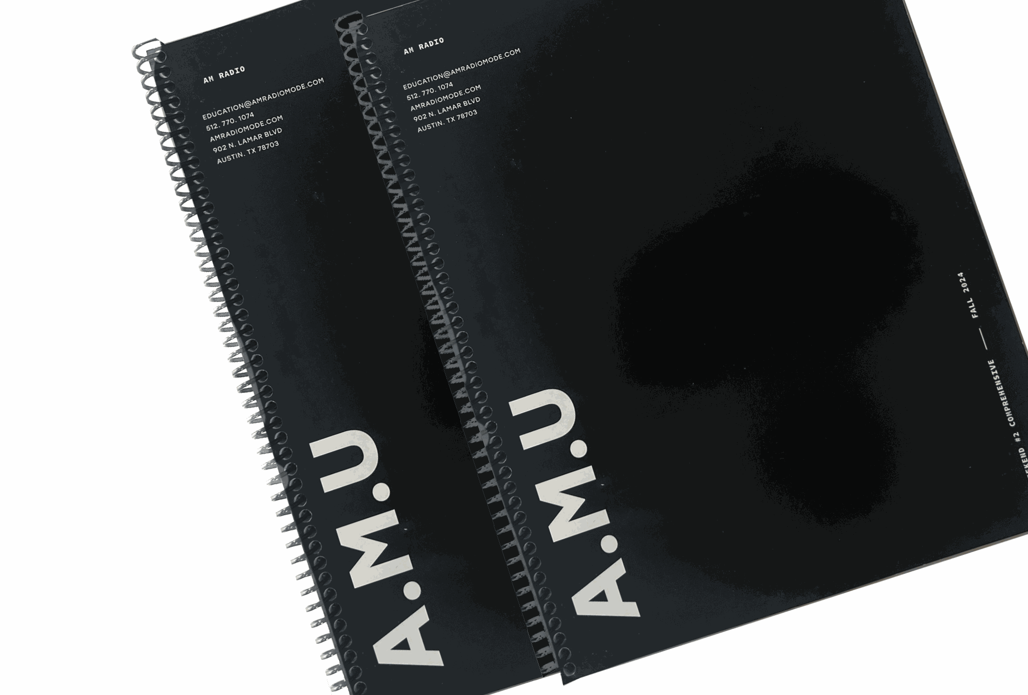 Authentic Method University Pilates program spiral notebooks with AMU branding