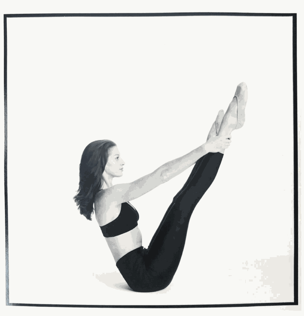 Woman performing Pilates V-sit pose in black workout clothes for Cadi/Mat Workshop