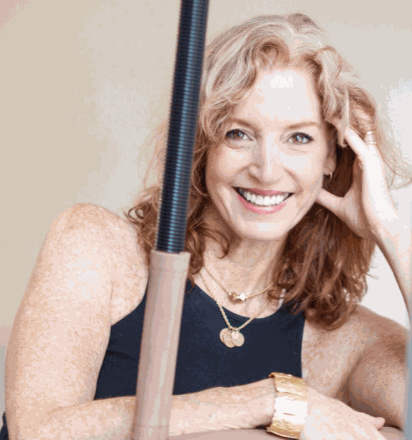 Brooke Siler smiling during Pilates workshop observation for All Four Workshops event